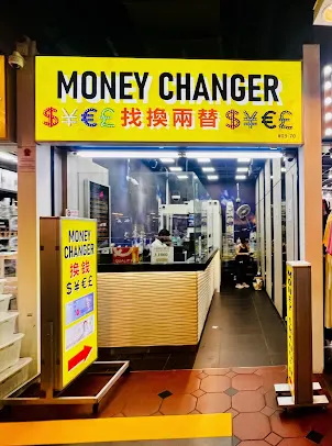 Jurong Point counter entrance with the yellow money changer sign at unit #03-70